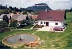 Königstein, Haus mit Festung und Teich